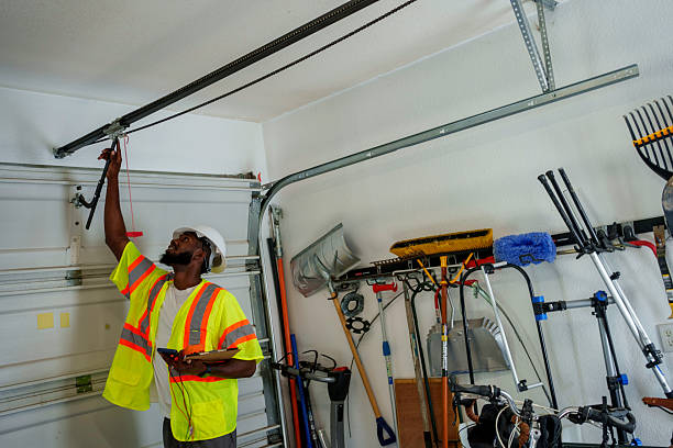 Professional Garage Door Panel Replacement technician working in Bray, OK